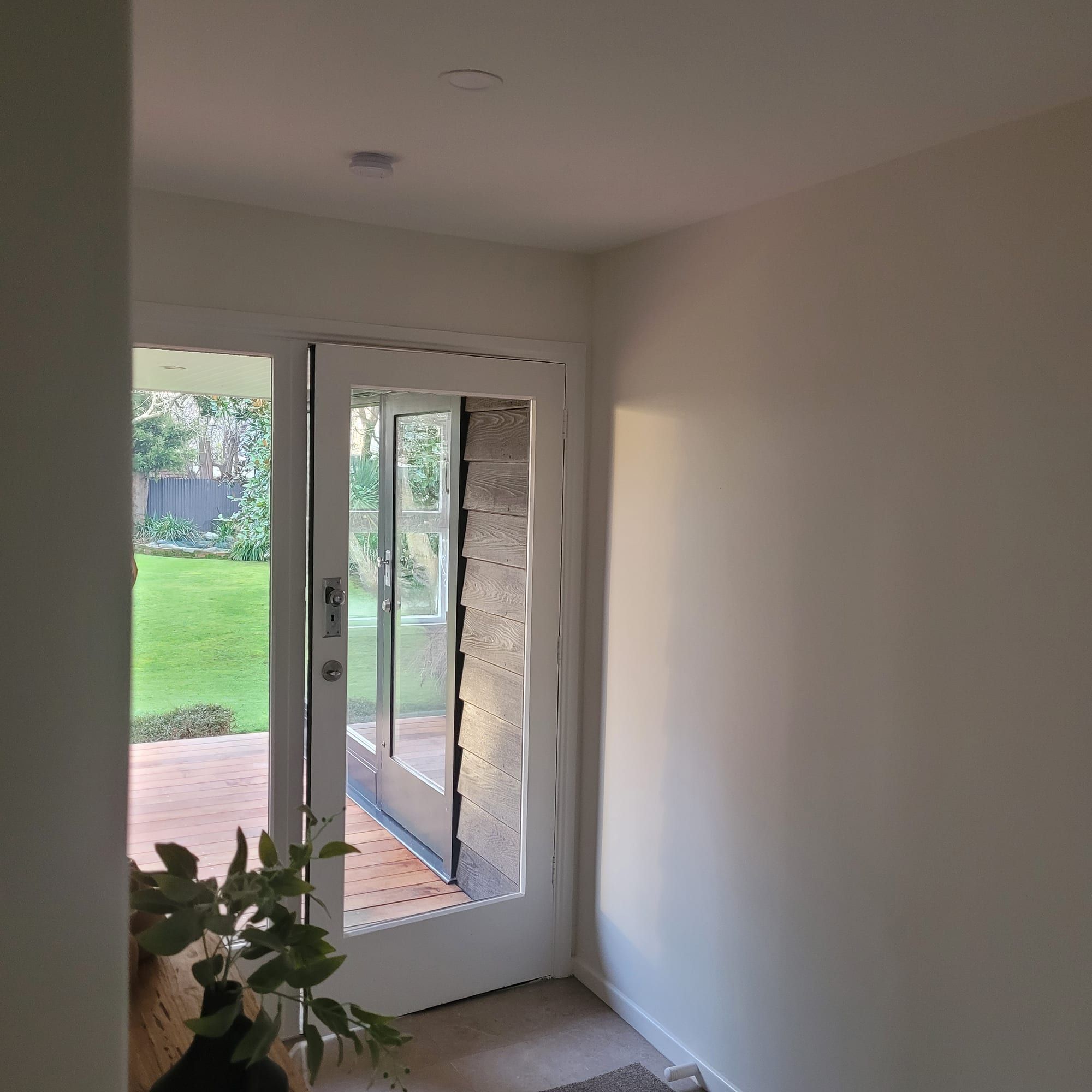 Bright living area repaint with a fireplace