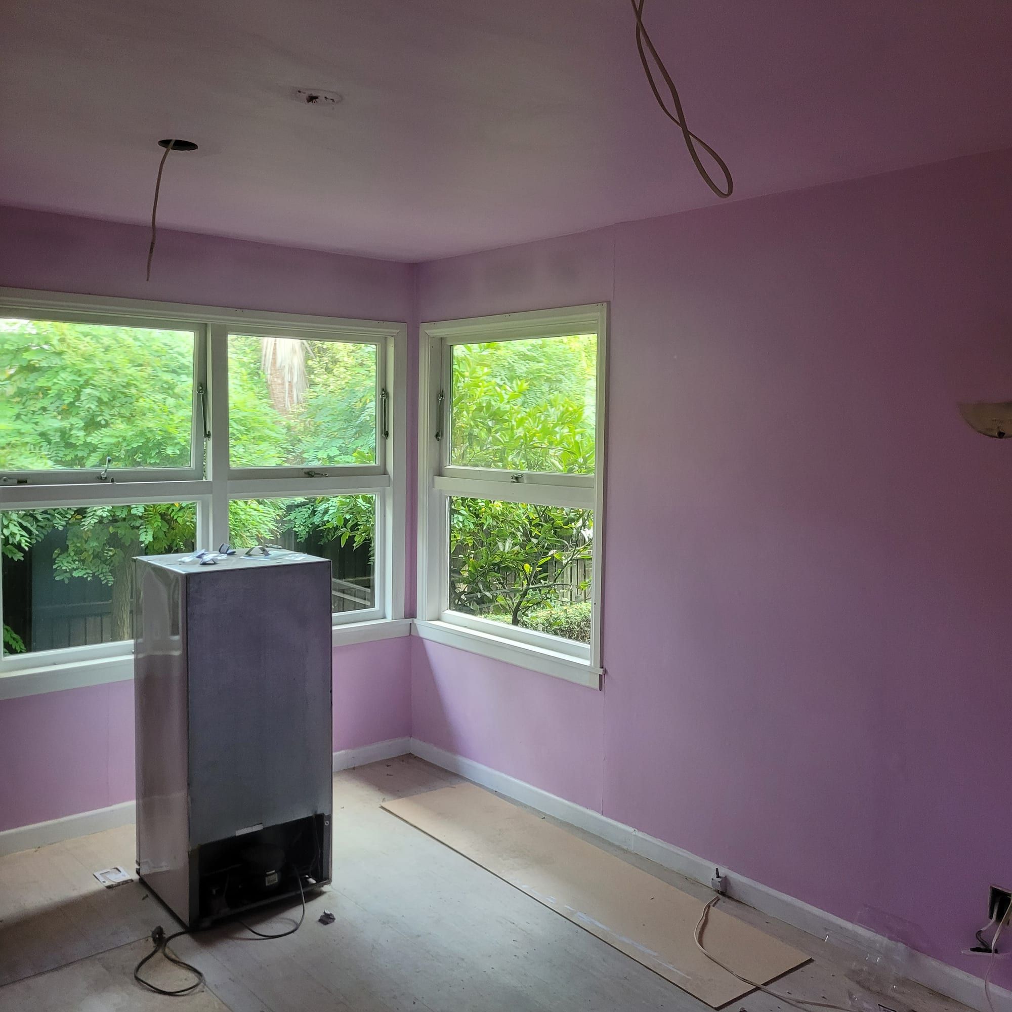 Lilac feature room with a bay window